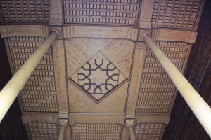 the intricate wood work on the ceiling